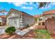 Inviting single-story home with a two-car garage, pathway, and desert landscaping at 9962 Catalina Canyon Ave, Las Vegas, NV 89147