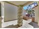 The front porch features a textured concrete column and a covered entryway at 9962 Catalina Canyon Ave, Las Vegas, NV 89147