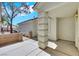 The front porch features a textured concrete column and a covered entryway at 9962 Catalina Canyon Ave, Las Vegas, NV 89147