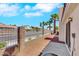 Image of the side yard shows an air conditioning unit, rock covering, and exterior of the house at 9962 Catalina Canyon Ave, Las Vegas, NV 89147