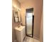 Cozy bathroom with a vanity sink and shower with glass door at 1020 Wengert Ave, Las Vegas, NV 89104