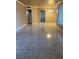 Spacious living room featuring tile floors and ample natural light at 1020 Wengert Ave, Las Vegas, NV 89104