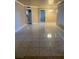 Spacious living room featuring tile floors and ample natural light at 1020 Wengert Ave, Las Vegas, NV 89104