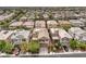 Overhead view of a neighborhood showcasing well-maintained homes and landscaping at 10425 White Princess Ave, Las Vegas, NV 89166