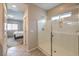 Bathroom featuring a glass enclosed shower and tile flooring at 10425 White Princess Ave, Las Vegas, NV 89166