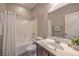 Bathroom with shower-tub combination, vanity, and neutral decor at 10425 White Princess Ave, Las Vegas, NV 89166