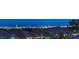 Panoramic city skyline view from a residential neighborhood at twilight at 10425 White Princess Ave, Las Vegas, NV 89166