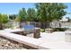 Outdoor kitchen with built-in BBQ grill and countertop space at 10425 White Princess Ave, Las Vegas, NV 89166