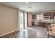 Kitchen and dining area with sliding doors to backyard at 10425 White Princess Ave, Las Vegas, NV 89166