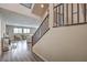 Spacious living room with staircase and hardwood floors at 10425 White Princess Ave, Las Vegas, NV 89166