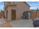 Home's backyard includes a shed, custom privacy screen, and grill area for entertaining at 10728 Brewster Bay St, Las Vegas, NV 89179