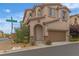 Charming two-story home with a large two car garage, covered entry and tasteful landscaping at 10728 Brewster Bay St, Las Vegas, NV 89179