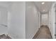 Upstairs hallway with carpeted floor leading to bedrooms at 10728 Brewster Bay St, Las Vegas, NV 89179