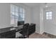 Upstairs office nook featuring a dark desk and carpeted floor with natural light at 10728 Brewster Bay St, Las Vegas, NV 89179