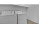 Functional laundry room featuring a washer, a dryer, and storage space at 10728 Brewster Bay St, Las Vegas, NV 89179