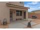 Covered patio with space for seating, ideal for enjoying outdoor meals or relaxing with a drink at 10728 Brewster Bay St, Las Vegas, NV 89179