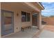 The covered patio features ample seating and backyard access, perfect for entertaining guests at 10728 Brewster Bay St, Las Vegas, NV 89179