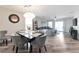 Open-concept living space showcases modern furnishings and seamless flow to the dining area at 10741 Pearl River Ave, Las Vegas, NV 89166