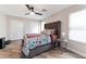 Spacious main bedroom with a large bed, ceiling fan and closet at 10741 Pearl River Ave, Las Vegas, NV 89166