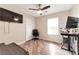 Bright office space with a closet, desk and modern computer equipment at 10741 Pearl River Ave, Las Vegas, NV 89166