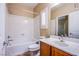 Bright bathroom featuring a shower-tub combination, sink, and modern fixtures at 11242 Almador Vista Ct, Las Vegas, NV 89135