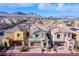 Charming two-story home with a well-manicured front yard, showcasing a welcoming entrance and appealing curb appeal at 11242 Almador Vista Ct, Las Vegas, NV 89135