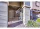 Inviting gated front entrance with decorative brickwork and lush landscaping at 11242 Almador Vista Ct, Las Vegas, NV 89135