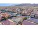 Expansive neighborhood view displaying a variety of well-maintained homes, complemented by a scenic mountain backdrop at 11242 Almador Vista Ct, Las Vegas, NV 89135