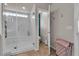 A well-lit bathroom with a large glass shower and separate toilet area at 1161 Sax Fifth Ave, Henderson, NV 89052