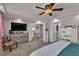 This primary bedroom has an en suite bathroom and spacious walk in closet at 1161 Sax Fifth Ave, Henderson, NV 89052