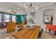 Open dining area with stylish furnishings and views into the living room and kitchen at 1161 Sax Fifth Ave, Henderson, NV 89052