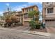 Attractive multi-story home with a well-maintained lawn, inviting curb appeal, and a private driveway at 1161 Sax Fifth Ave, Henderson, NV 89052