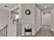 A bright hallway with access to different areas of the home, lit by recessed lighting at 1161 Sax Fifth Ave, Henderson, NV 89052