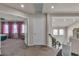 Hallway with a view of bedroom with purple curtains at 1161 Sax Fifth Ave, Henderson, NV 89052