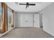 Relaxing bedroom featuring a large closet, natural light and neutral colored walls at 1481 Rancho Ridge Dr, Henderson, NV 89012