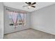 Light and airy bedroom featuring neutral tones and a window with views at 1481 Rancho Ridge Dr, Henderson, NV 89012