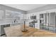 Modern kitchen showcasing white cabinets, stainless steel appliances, and a wooden island at 1481 Rancho Ridge Dr, Henderson, NV 89012