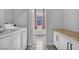 Laundry room with cabinetry, washer, dryer, and tiled floors at 1481 Rancho Ridge Dr, Henderson, NV 89012