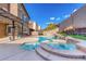 Backyard pool and spa with a large deck area and covered patio offering the perfect outdoor living space at 1481 Rancho Ridge Dr, Henderson, NV 89012