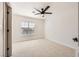 Clean bedroom with a modern ceiling fan and a bright window at 150 Wentworth Dr, Henderson, NV 89074