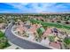 Desirable neighborhood with well-kept homes, mature trees, and lush landscaping, offering a tranquil and inviting atmosphere at 150 Wentworth Dr, Henderson, NV 89074