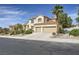 Charming two-story home with a two-car garage, desert landscaping, and a concrete driveway at 150 Wentworth Dr, Henderson, NV 89074