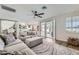 Spacious living room features lots of natural light, contemporary furnishings, and backyard access at 150 Wentworth Dr, Henderson, NV 89074