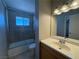 Bathroom with shower-tub combo and vanity at 173 Greenbriar Townhouse Way, Las Vegas, NV 89121