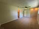 Spacious bedroom with neutral walls, closet, and ceiling fan at 173 Greenbriar Townhouse Way, Las Vegas, NV 89121