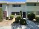 Charming townhouse with low-maintenance landscaping and neutral exterior paint at 173 Greenbriar Townhouse Way, Las Vegas, NV 89121