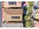 Birds eye view of backyard with pavers, artificial turf, desert landscaping, and solar panels at 1794 Morro Vista Dr, Las Vegas, NV 89135