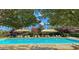 Large community pool with shaded lounge areas and ample seating at 1794 Morro Vista Dr, Las Vegas, NV 89135