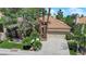 Charming home with a two-car garage, well-manicured landscaping, and a tile roof, offering great curb appeal at 1848 Indian Bend Dr, Henderson, NV 89074