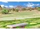 Scenic view of the golf course with lush green grass and mountain views for a relaxing community atmosphere at 1848 Indian Bend Dr, Henderson, NV 89074